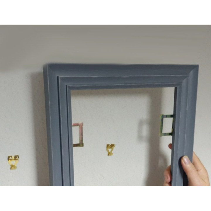 Colgador regulable para marcos de madera. 10 ud